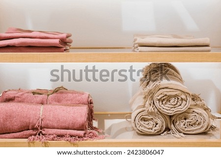 Cotton plaids are beautifully laid out on the counter at the home improvement store