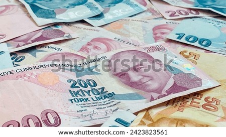 Background of Turkish lira. Turkish money. 50, 100 and 200 tl notes. Banner for website, desktop wallpaper, copy space for text and advertising, blank, empty, white, clear space Royalty-Free Stock Photo #2423823561