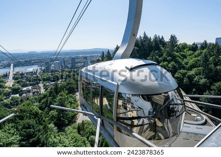 An Aerial Tram stopped at the upper station of the Portland Aerial Tram at the Oregon Health  Science University commonly referred to as OHSU.