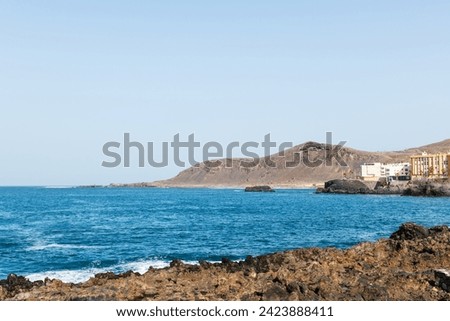 Panorama view of Las Canteras beach at Las Palmas de Gran Canaria in the Canary Islands in Spain. Royalty-Free Stock Photo #2423888411