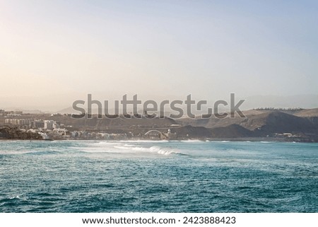 Panorama view of Las Canteras beach at Las Palmas de Gran Canaria in the Canary Islands in Spain. Royalty-Free Stock Photo #2423888423