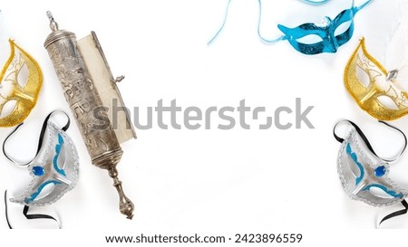 The Scroll of Esther and Purim Festival objects (masquerade mask) on white background. Top view
