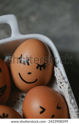 A picture of an egg that reflects the simplicity and beauty of nature at the same time. The egg shown in the picture is a regular chicken egg, with a smooth and shiny shell.