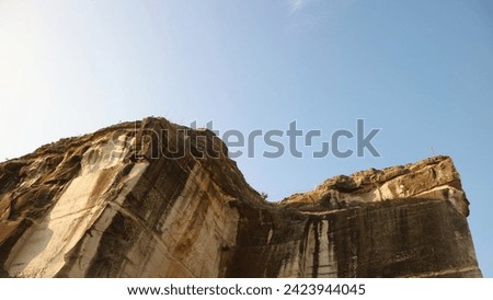 limestone cliffs with a clear sky in the background