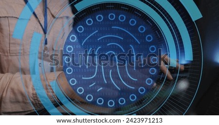 Image of fingerprint in circles over hands of caucasian man typing on laptop. Network, data security and digital safety concept digitally generated image.