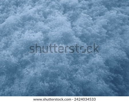 Pure white snow in close-up. Royalty-Free Stock Photo #2424034533