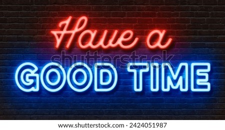 Neon sign on a brick wall - Have a good time