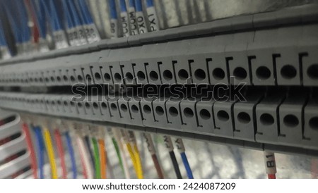 Auxiliary photo electrical Auxiliary points for wiring photo close-up photo electronic  Royalty-Free Stock Photo #2424087209