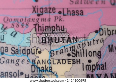 Bhutan on political map of globe, travel concept, selective focus, background