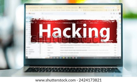 Laptop computer displaying the sign of hacking on an internet email site