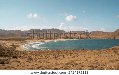 Panoramic view of Los Genoveses beach, Almeria, Andalusia, Spain. Photograph from a hill on the south side of the beach. Mediterranean Sea in Cabo de Gata.