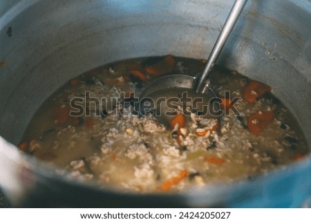 The boiled rice with pork