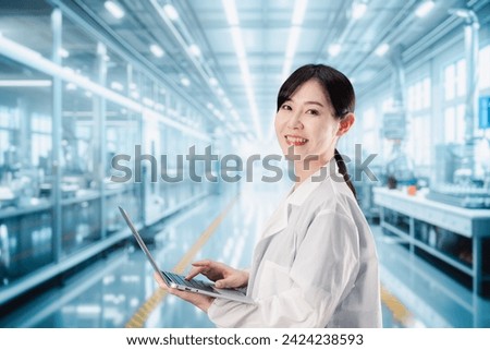 Female researcher analyzing data in a laboratory