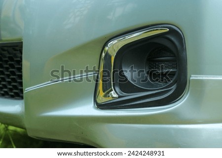 aero filter in front of car with  a bee house design and little risk for maintenance Royalty-Free Stock Photo #2424248931