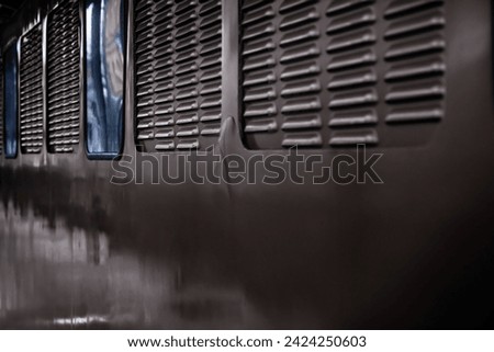 A durable electric locomotive made of metal parts Royalty-Free Stock Photo #2424250603