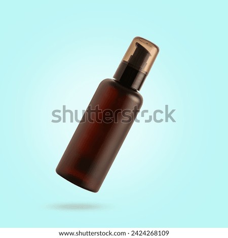  Brown cosmetic spray container on light turquoise background. product packaging collection.