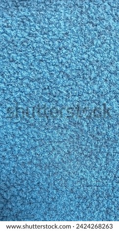 Texture of greenish blue wool fabric Royalty-Free Stock Photo #2424268263