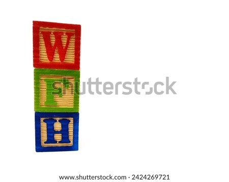 The term "WFH" is arranged horizontally using wooden blocks. The picture was taken on a white background.