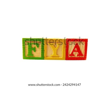 The term "FYA" is arranged with wooden blocks horizontally. The picture was taken on a white background.