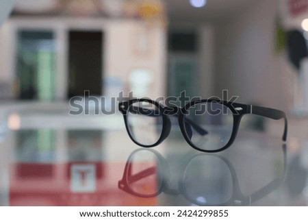 Closeup of glasses on a table in optical