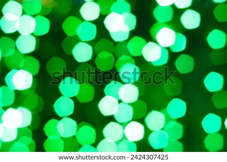 Beautiful green bokeh lights background.