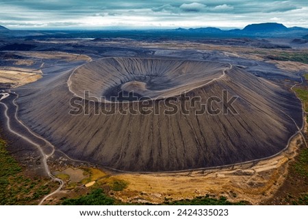 Aerial view of Large Hverfjall volcano crater is Tephra cone or Tuff ring volcano on gloomy day in Myvatn area at Northern of Iceland