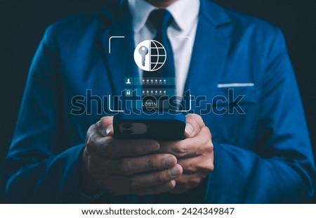 Shield sensitive business and financial information from cyber threats. Businessman leverages smartphone internet network security measures. Includes encrypting user data protection and cybersecurity Royalty-Free Stock Photo #2424349847