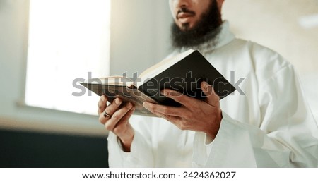 Muslim man, reciting and mosque for reading quran with faith, idea or culture for worship, praise or study. Islamic person, religion and peace in book, prayer and thinking for meditation in Palestine Royalty-Free Stock Photo #2424362027
