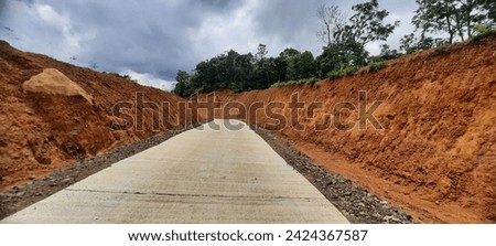 new road cuts through the mountains.