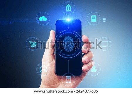 Close up of male hand holding smartphone with thumb print, creative round digital interface with various icons. Digital transformation, online banking, shopping and storage concept Royalty-Free Stock Photo #2424377685