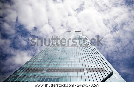 glass building, up, clouds, Close-up of business financial district headquarters in modern skyscrapers. Blue clean modern glass wall with sky and clouds reflection. shopping area,