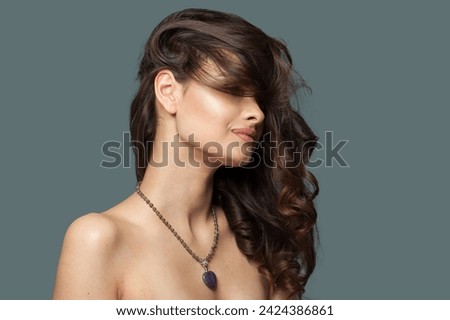 Cute jewelry model. Woman with bijou close up Royalty-Free Stock Photo #2424386861