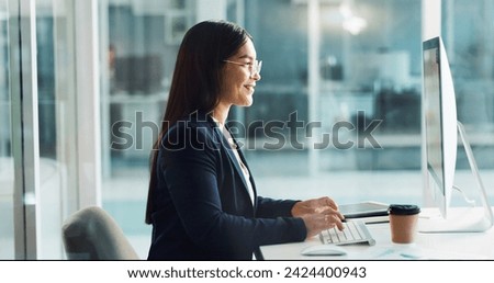 Business woman, typing on computer and happy copywriting, online planning and office software. Young worker, editor or writer working on desktop for research, report or editing of company newsletter