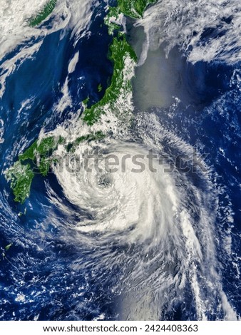 Typhoon Namtheun 13W south of Japan. . Elements of this image furnished by NASA. Royalty-Free Stock Photo #2424408363