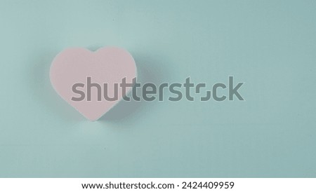 Heart pink on blue background 