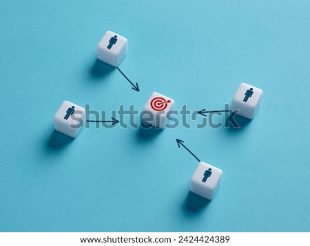 Setting and achieving common goals. Gathering a team around the common goal. Inspire people towards the company objectives. Royalty-Free Stock Photo #2424424389