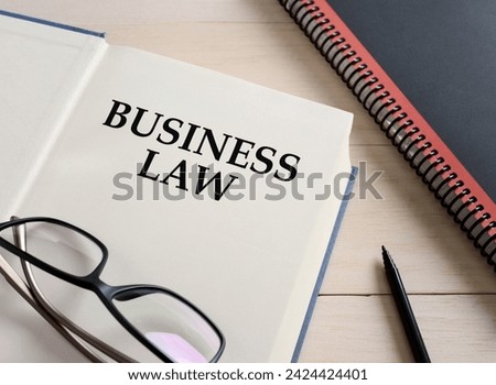 Business law book on the office desk. Studying or learning business law concept. 