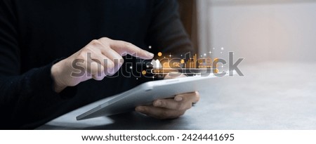 businessman hand touch screen on digital tablet to use marketing tool to announce promotion and special offer and checking traffic research of pay per click program on web page for online business