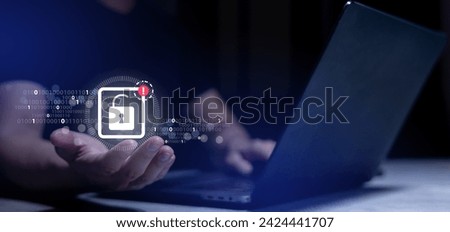 close up man hand show unlocking icon of padlock with warning sign after security system fail by hacking binary code in the dark operation room for digital information and leakage GDPR data concept
