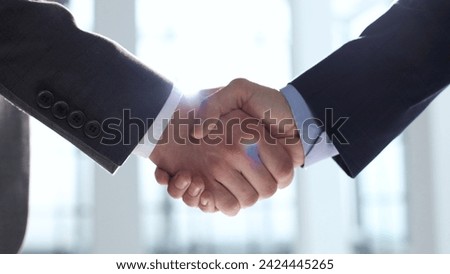 Handshake after a deal, successful deal, teamwork Royalty-Free Stock Photo #2424445265