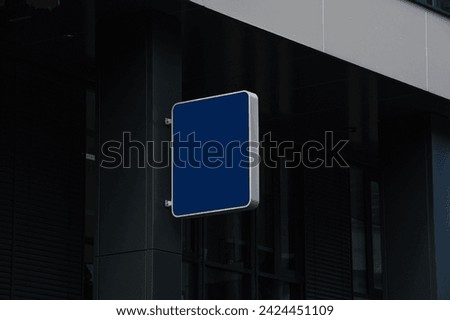 advertising sign on the facade of the building. mockup