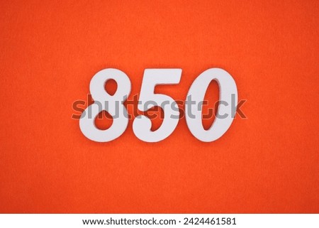 Orange felt is the background. The numbers 850 are made from white painted wood.