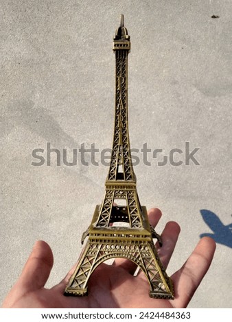 This is a picture of paris The Eiffel Tower, an iconic symbol of Paris, stands majestically along the Champ de Mars. Completed in 1889 for the Exposition Universelle, this wrought-iron marvel was init
