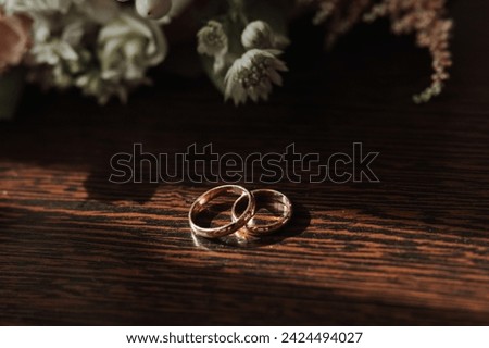 Two gold wedding rings for brides as a symbol of eternity. Everything is ready for the wedding ceremony. An offer of a hand and a heart