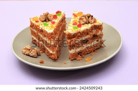 Carrot cakes. A festive dessert for women's day. Side view. Close-up. Lifestyle. Royalty-Free Stock Photo #2424509243
