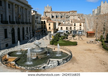 Avila town in Spain. Adolfo Suarez square (Plaza Adolfo Suarez) with cathedral in background. Royalty-Free Stock Photo #2424516835