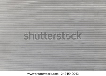 A bathroom wall with light-colored grated tiles in a modern style. Vector tiles texture background