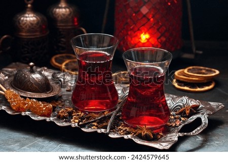 Aromatic  tea in  Turkish traditional  glass cups. Selective focus 