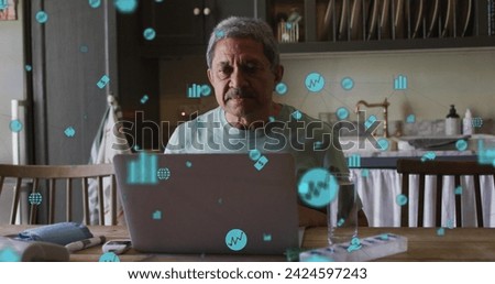 Image of data processing with digital financial icons over worried senior man using laptop. digital interface, global connection and communication concept digitally generated image.