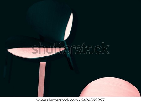 An abstract of a wooden chair and part of a table have been enhanced. 
